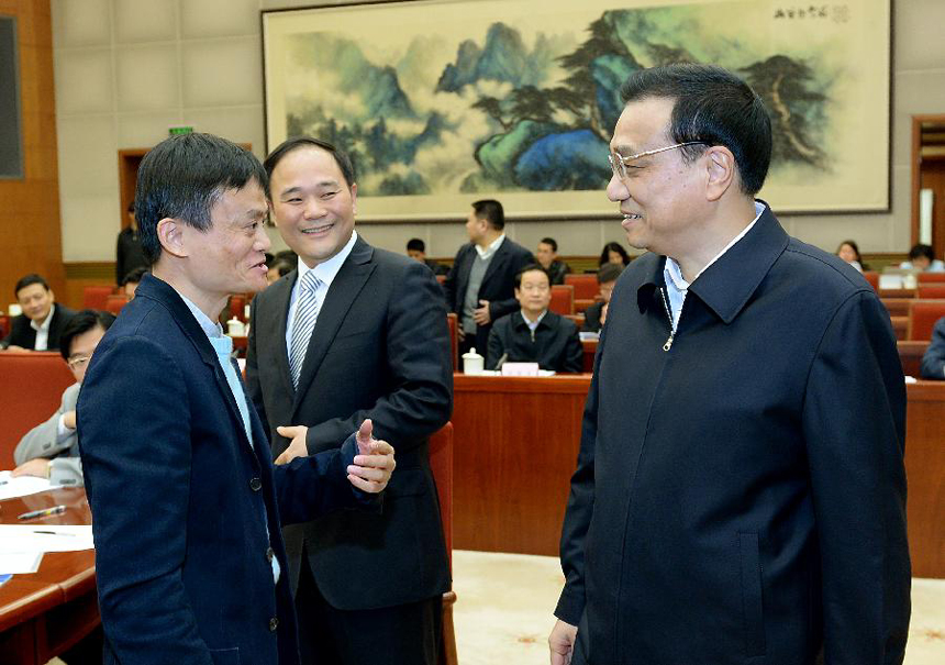 Chinese Premier Li Keqiang (R) has conversation with entrepreneur Ma Yun (L) and Li Shufu, during a meeting attended by experts and entrepreneurs to discuss the economic development, in Beijing, capital of China, Oct. 31, 2013.