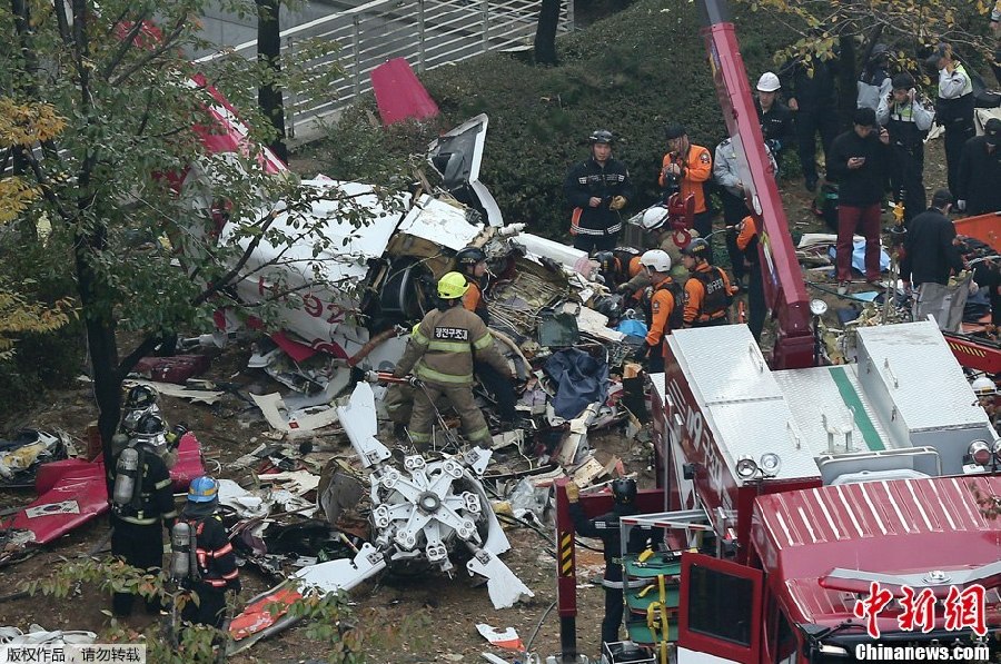 Helicopter crashes into residential building in Seoul. [CNS]