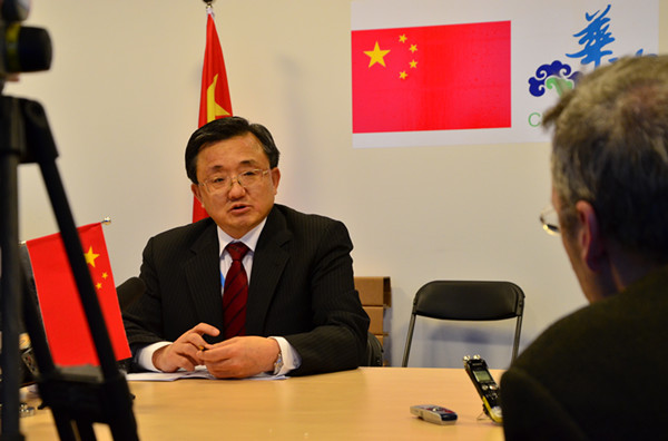 Liu Zhenmin, deputy chief of the Chinese delegation and Vice Minister for Foreign Affairs, is interviewed at China Pavilion during Warsaw Climate Change Conference on Nov. 21. [Photo by Gong Yingchun/China.org.cn]