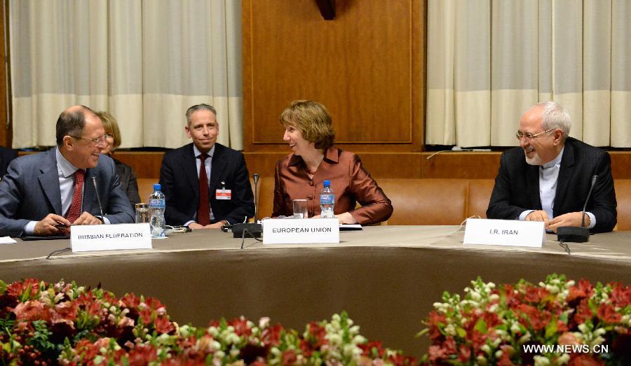 EU foreign policy chief Catherine Ashton (2nd R), Iranian Foreign Minister Mohammad Javad Zarif (R) and Russian Foreign Minister Sergei Lavrov (1st L) attend the Iran nuclear talks at the Palais des Nations in Geneva, Switzerland, Nov. 24, 2013.