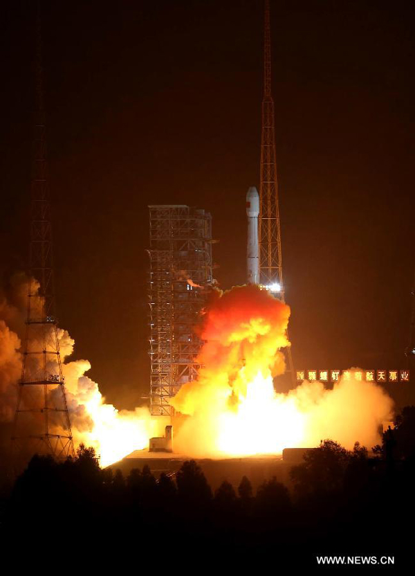 The Long March-3B carrier rocket carrying China's Chang'e-3 lunar probe blasts off from the launch pad at Xichang Satellite Launch Center, southwest China's Sichuan Province, Dec. 2, 2013.