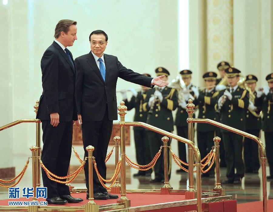 Chinese Premier Li Keqiang held an official welcoming ceremony for visiting British Prime Minister David Cameron at the Great Hall of the People in Beijing December 2, 2013. British Prime Minister David Cameron on Monday morning arrived in Beijing for a three-day official visit to China.