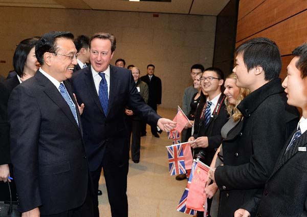 Chinese Premier Li Keqiang (L) and British Prime Minister David Cameron (2nd L) visit the National Museum of China, Beijing, capital of China, Dec. 2, 2013. [Xinhua photo]