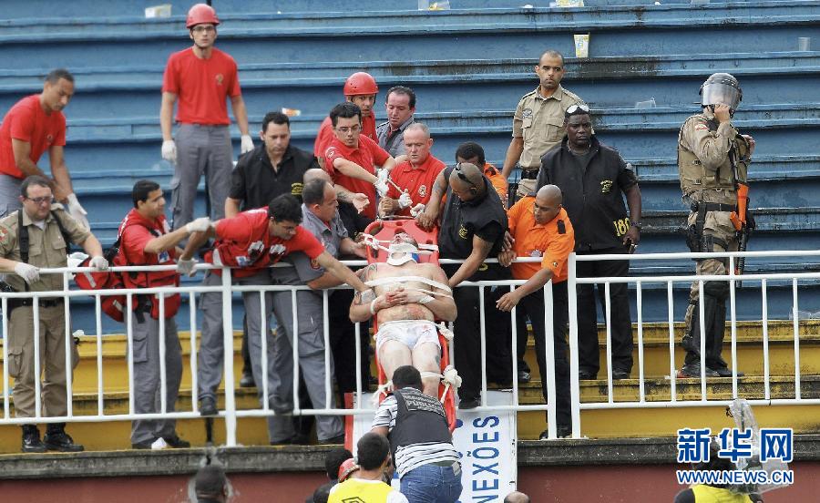 Three people are injured in a brawl at a football match in southern Brazil in a violent end to Brazil's football league season. 