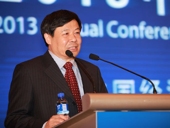 China's Vice Finance Minister Zhu Guangyao delivers a keynote speech at the annual meeting of the China Chamber of International Commerce (CCOIC) in Beijing on Dec. 11, 2013.  [Sina photo]