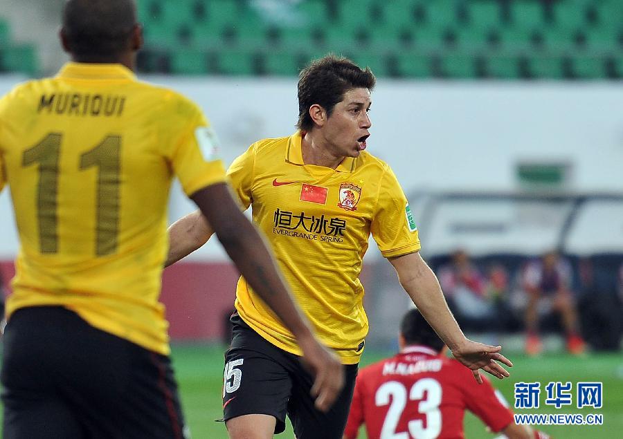 Asian Champions Guangzhou Evergrande saw off African counterparts Al Ahly 2-0 on Saturday to set up a FIFA Club World Cup semi-final against European champions Bayern Munich. [Xinhua]