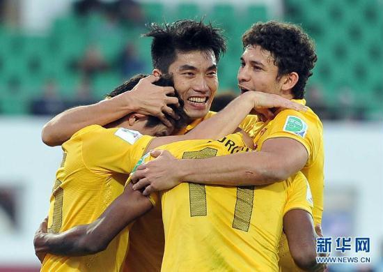 Chinese football team Guangzhou Evergrande have beaten Al Ahly of Egypt 2-nil to reach the semi-finals of the FIFA Club World Cup in Morocco. The victory means Guangzhou, coached by Italian World Cup winner Marcello Lippi, will move on to the semi-finals where they will face European champions Bayern Munich on Tuesday. [photo / Xinhua]