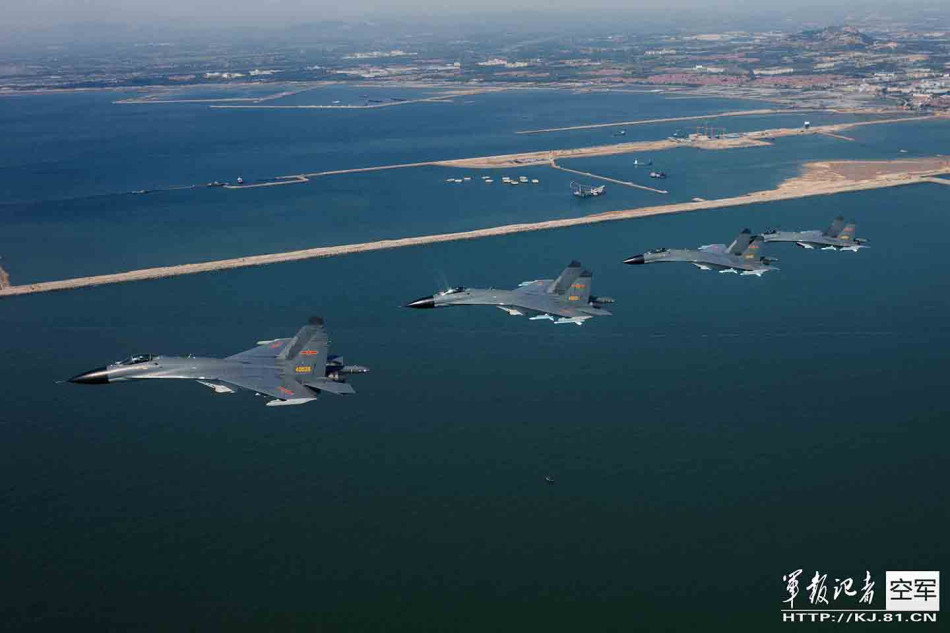 The J11B jet fighters of the People’s Liberation Army Air Force conduct an exercise on Dec.19, 2013. [File photo: kj.81.cn]