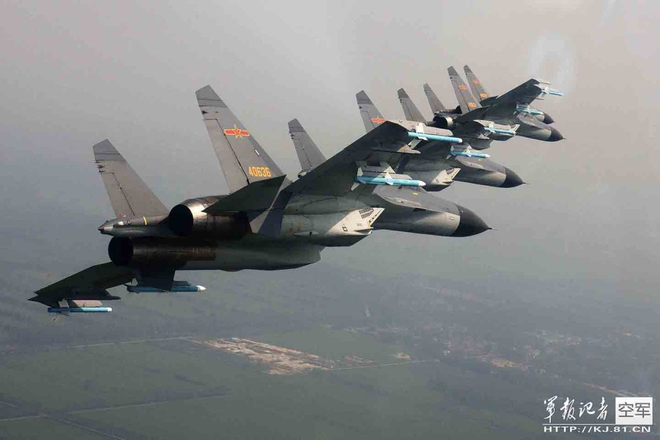 The J11B jet fighters of the People’s Liberation Army Air Force conduct an exercise on Dec.19, 2013. [File photo: kj.81.cn]