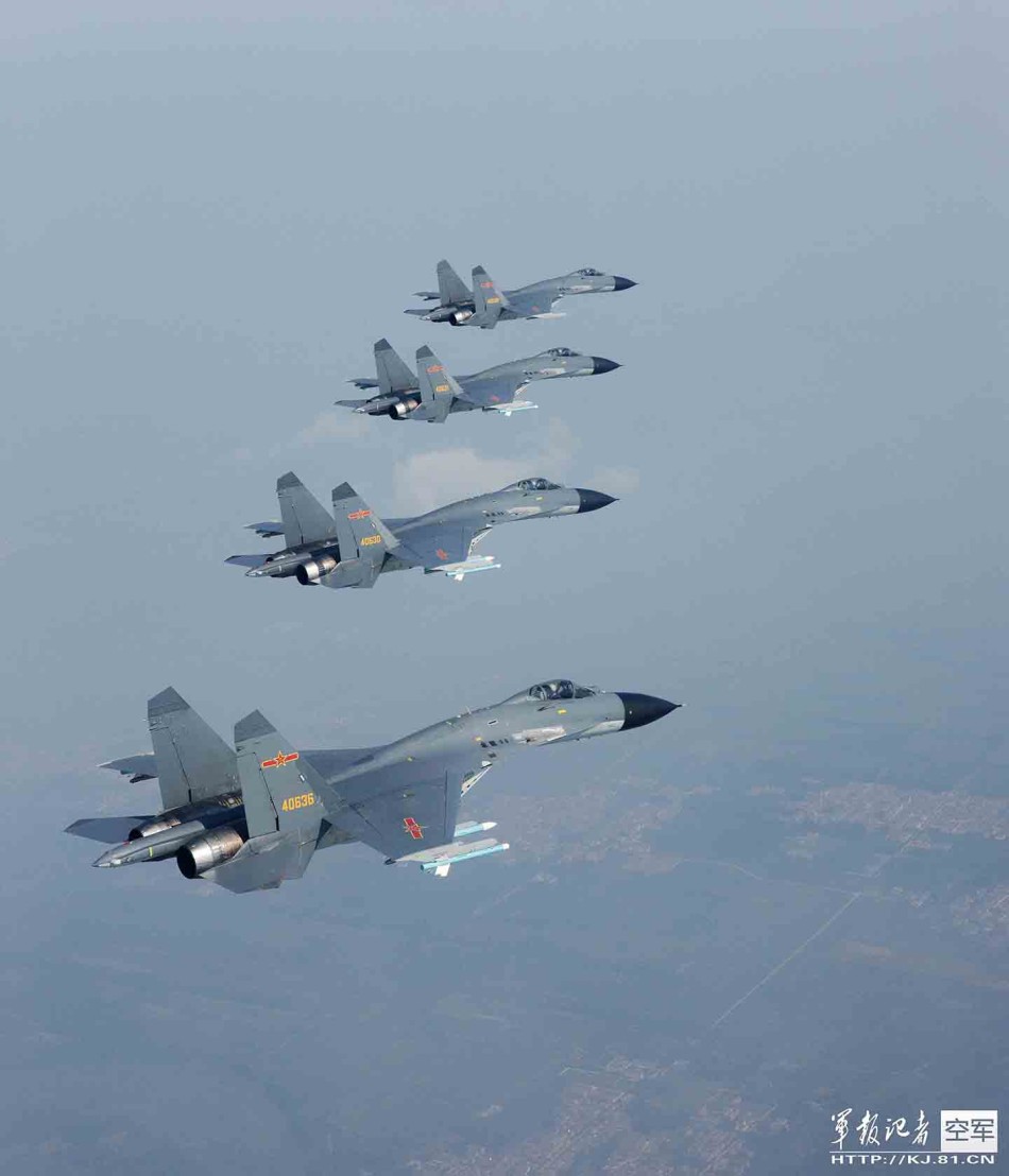 The J11B jet fighters of the People’s Liberation Army Air Force conduct an exercise on Dec.19, 2013. [File photo: kj.81.cn]