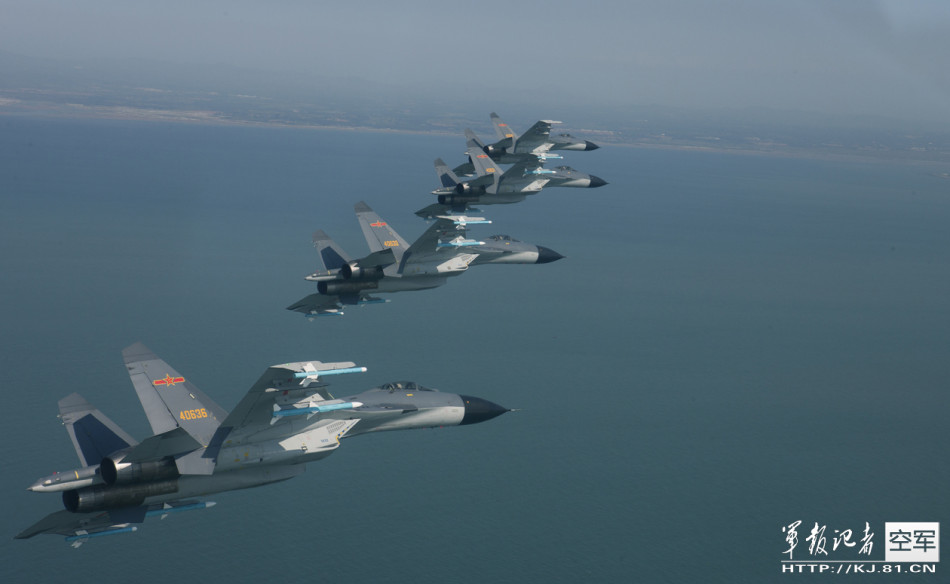 The J11B jet fighters of the People’s Liberation Army Air Force conduct an exercise on Dec.19, 2013. [File photo: kj.81.cn]