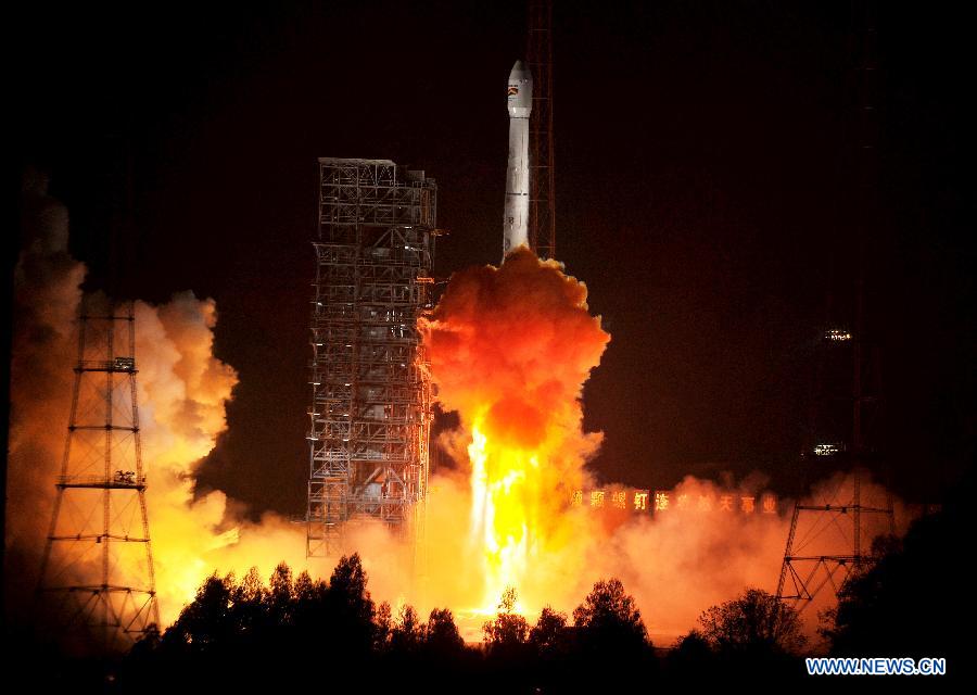A Bolivian communications satellite is launched from the Xichang Satellite Launch Center(XSLC), southwest China's Sichuan Province, Dec. 21, 2013. China successfully sent a Bolivian communications satellite into orbit with its Long March-3B carrier rocket at 0:42 a.m.(Beijing Time) Saturday. (Xinhua/Yan Yan)