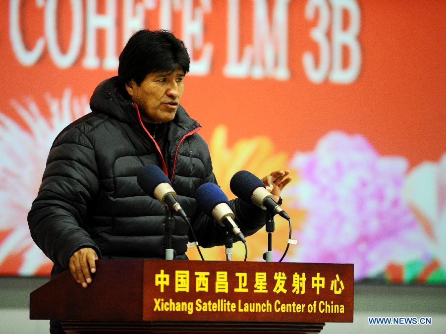 Bolivian President Juan Evo Morales Ayma delivers a speech after the successful launch of a Bolivian communications satellite at the Xichang Satellite Launch Center (XSLC), southwest China's Sichuan Province, Dec. 21, 2013. China successfully sent a Bolivian communications satellite into orbit with its Long March-3B carrier rocket at 0:42 a.m.(Beijing Time) Saturday.(Xinhua/Yan Yan)