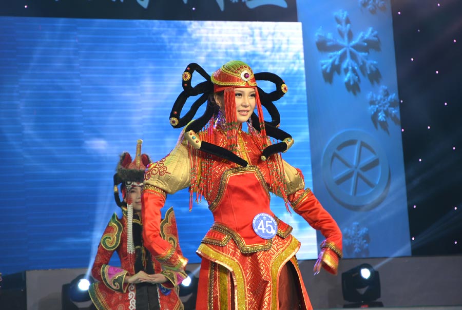 40 beauty contestants who stood out from the previous rounds competed in the final round of the international beauty competition. The beauty pageant was comprised of three categories including traditional folk costumes, swimsuit and evening wear. In the end, Butykova Tamara from Russia was crowned the champion. Pan Xiaotong and Chen Xi, both from China, finished second and third.[Photo by Bi Nan/chinadaily.com.cn]