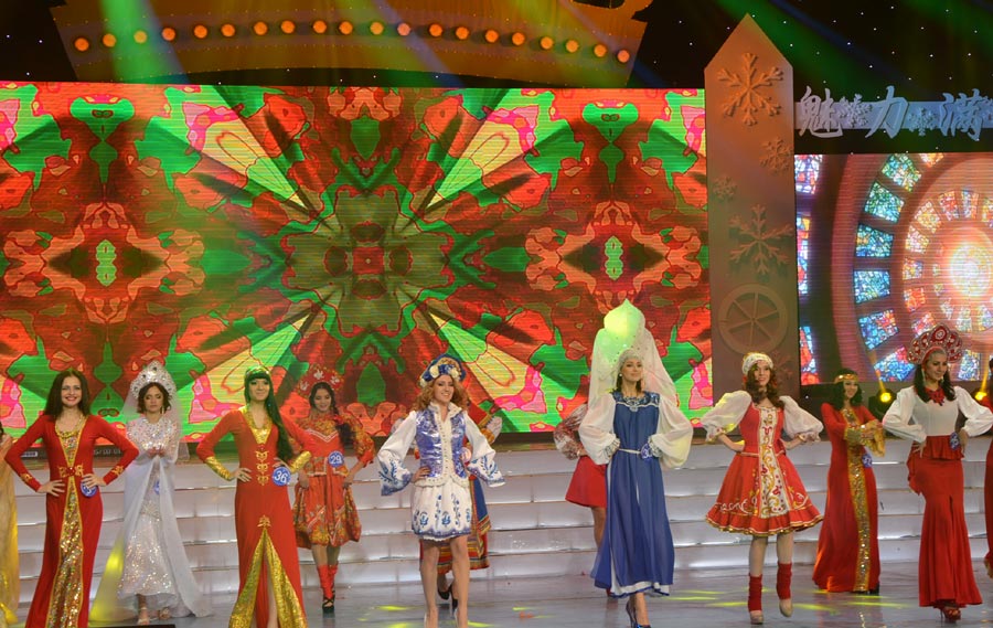 40 beauty contestants who stood out from the previous rounds competed in the final round of the international beauty competition. The beauty pageant was comprised of three categories including traditional folk costumes, swimsuit and evening wear. In the end, Butykova Tamara from Russia was crowned the champion. Pan Xiaotong and Chen Xi, both from China, finished second and third.[Photo by Bi Nan/chinadaily.com.cn]