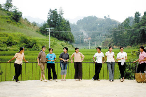 The wives who stay in the countryside not only bear the loneliness but also toil to keep their homes running. [file photo]
