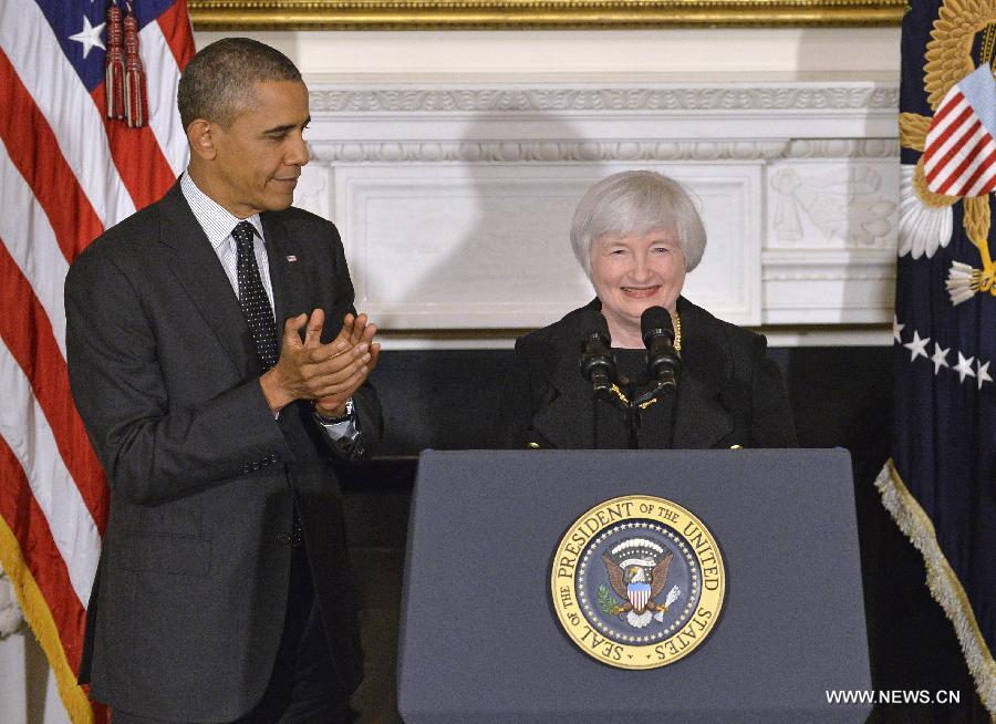 Janet Yellen (R), U.S. Federal Reserve vice chairwoman, speaks while U.S. President Barack Obama looks on during her nomination ceremony at the White House in Washington D.C., in this file photo taken on Oct. 9, 2013.