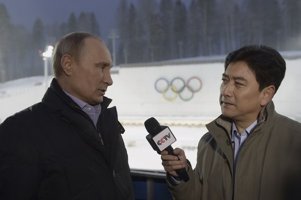 Russian President Vladimir Putin listens to a journalist's question during a televised news conference in Sochi January 19, 2014. [Photo/ China Daily]