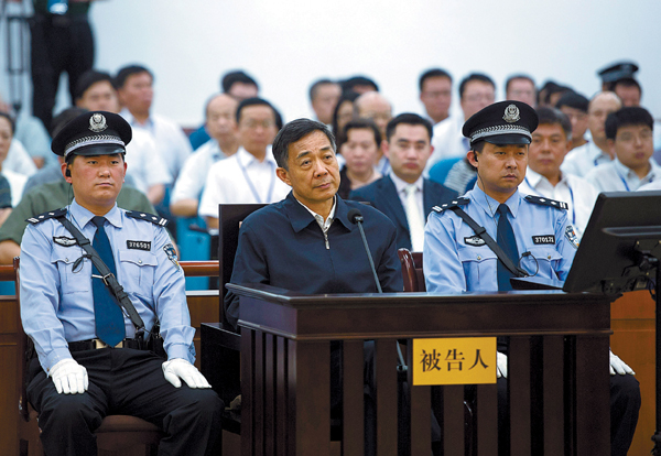 Former Chongqing Party chief Bo Xilai stands trial at the Jinan Intermediate People’s Court in Shandong province on Monday. [Xie Huanchi / Xinhua]