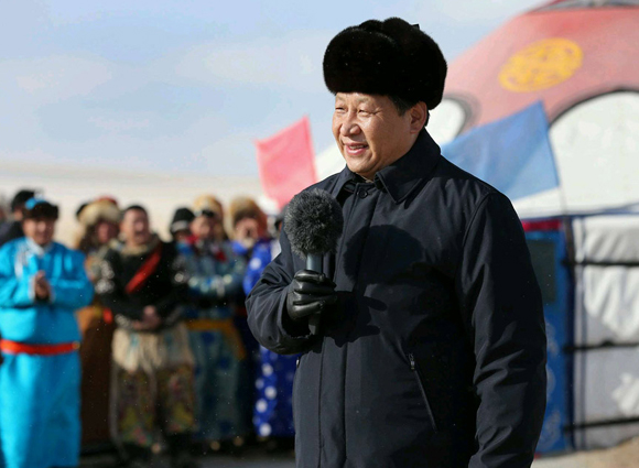 Chinese President Xi Jinping attends the winter Nadam Fair in Xilingol, north China's Inner Mongolia Autonomous Region on Monday, January 27th, 2014. [Photo/Xinhua]