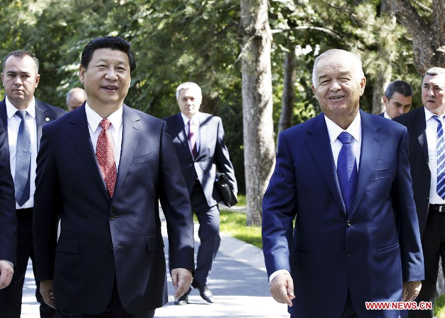Chinese President Xi Jinping (L front) meets with Uzbekistan's President Islam Karimov in Tashkent, Uzbekistan, Sept. 9, 2013. Xi arrived on Sept. 8, 2013 for a state visit to Uzbekistan. [Photo /Xinhua] 