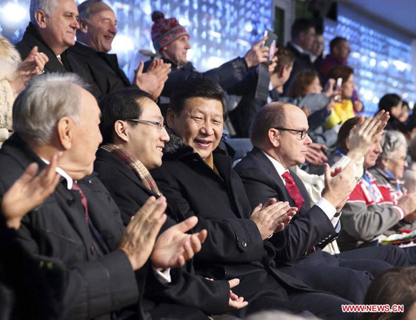 Chinese President Xi Jinping (front, 3rd L) attends the opening ceremony of the 22nd Winter Olympic Games in Sochi, Russia, Feb. 7, 2014. The 22nd Winter Olympic Games opened on Friday night in a spectacular ceremony. Chinese President Xi Jinping attended the ceremony at the invitation of his Russian counterpart Vladimir Putin. [Photo/Xinhua] 