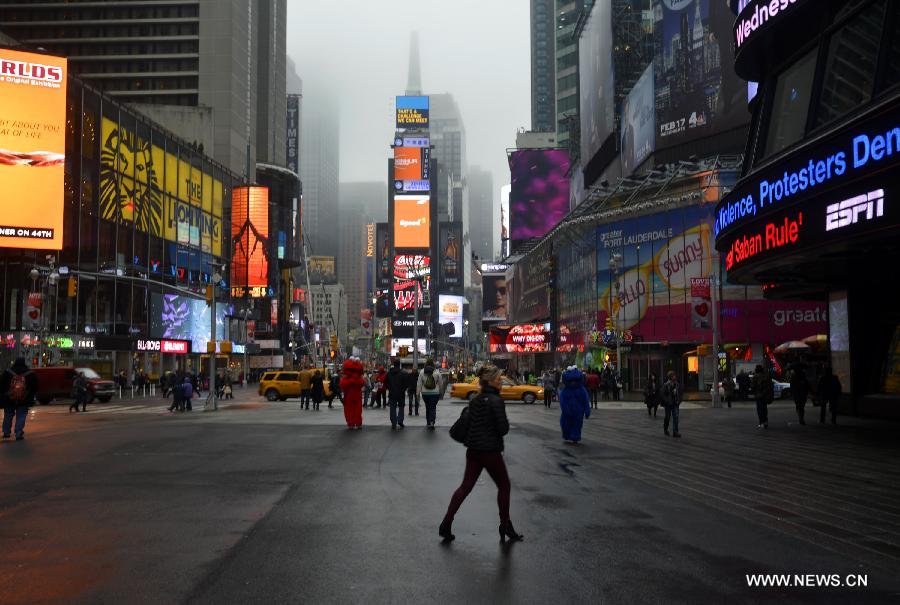 A dense fog covered New York City through Friday afternoon, causing some departure delays at airports in and near the city