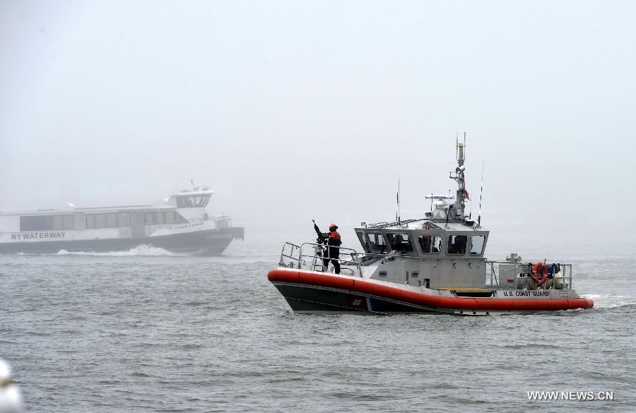 A dense fog covered New York City through Friday afternoon, causing some departure delays at airports in and near the city