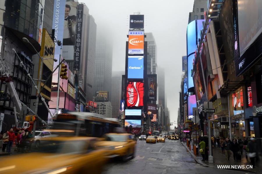 A dense fog covered New York City through Friday afternoon, causing some departure delays at airports in and near the city