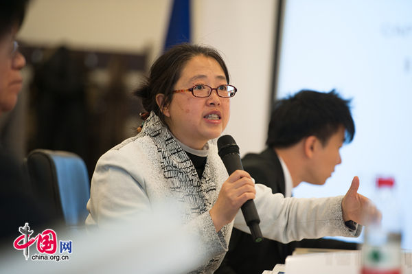 Prof. Tu Yonghong, Deputy Director of the IMI at RUC, also a principle contributor to the report, delivers a keynote speech at the launch of the report. [Photo by Chen Boyuan / China.org.cn]