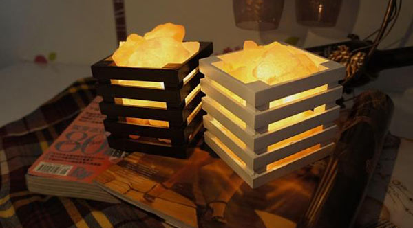 Lamps made from natural salt blocks can produce negative oxygen ions and through these improve indoor air quality.