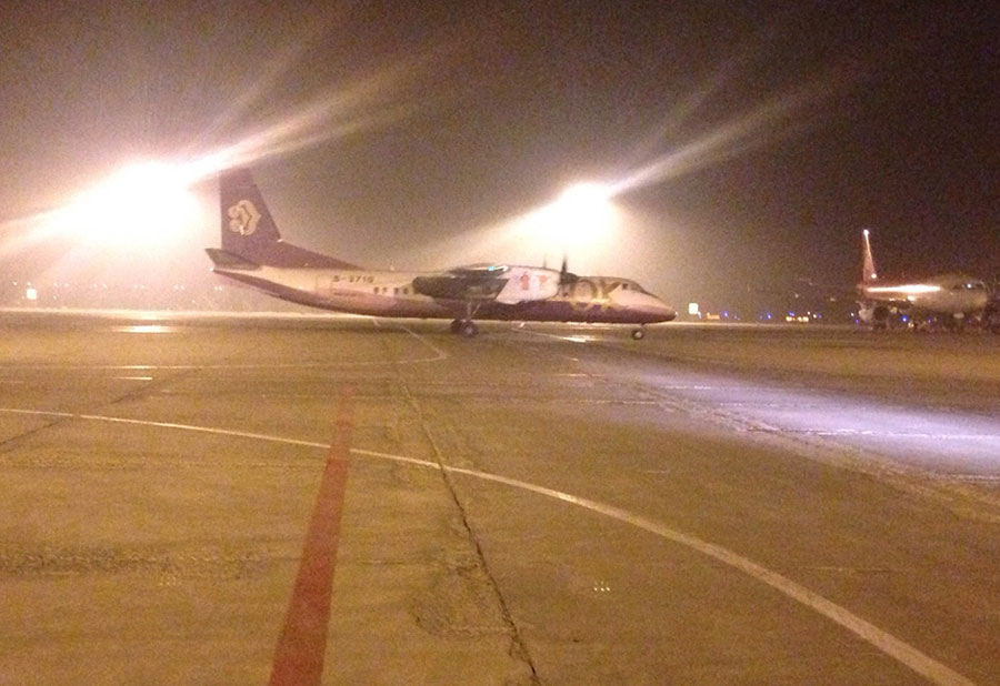 A flight bound for Shenyang in northeast China's Liaoning Province has made a successful landing after a faulty instrument forced it to delay descent on Tuesday, February 25, 2014. [Photo/sohu.com]