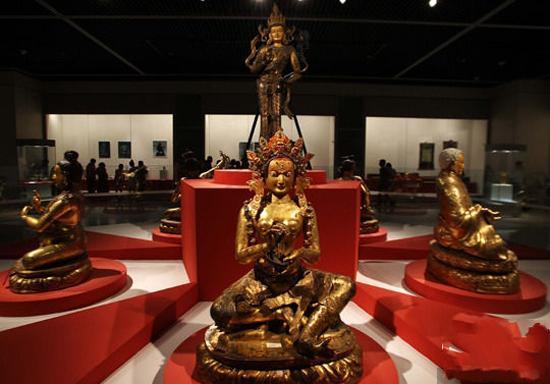 Tibetan Buddhist artifacts on display in a museum. 