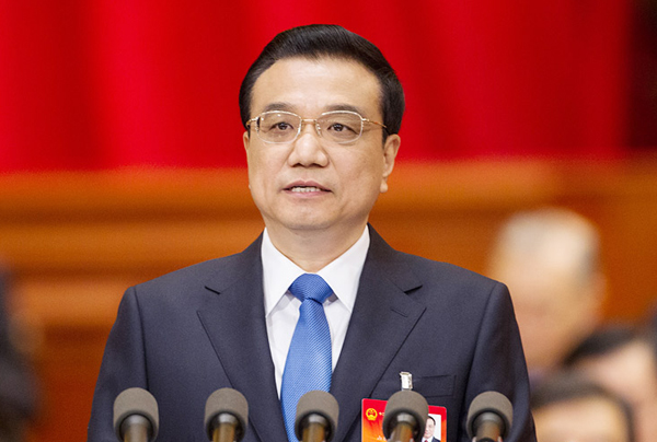 Chinese Premier Li Keqiang delivers the government work report during the opening meeting of the second session of the 12th National People's Congress (NPC) at the Great Hall of the People in Beijing, capital of China, March 5, 2014.[China.org.cn] 