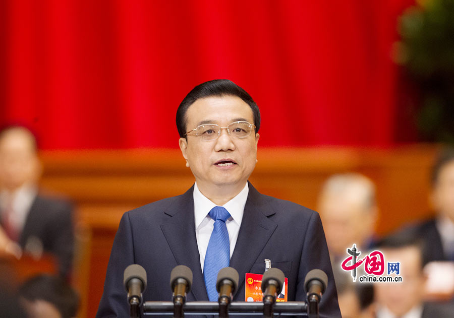Chinese Premier Li Keqiang delivers the government work report during the opening meeting of the second session of the 12th National People's Congress (NPC) at the Great Hall of the People in Beijing, capital of China, March 5, 2014.[PhotoChina.org.cn]