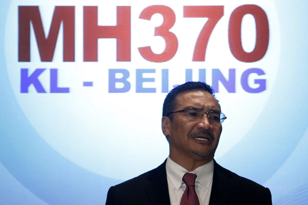 Malaysian officials hold news conference on missing plane