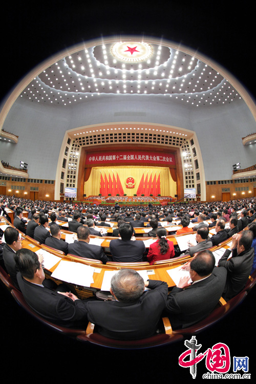  The opening ceremony of the second session of the 12th National People's Congress is held in the Great Hall of the People at 9 a.m. on March 5, 2014. The deputies heard the report on the work of the government delivered by Premier Li Keqiang and examined the annual reports on plan and budget. [China.org.cn/Xu Xun]