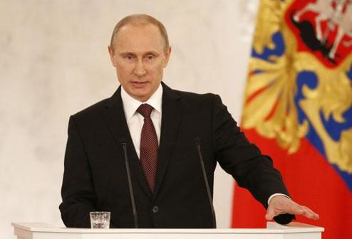 Russia's President Vladimir Putin addresses the Federation Council in Moscow's Kremlin on Tuesday, March 18, 2014.