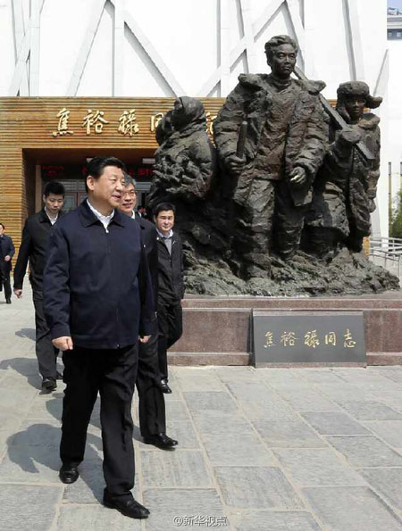 This photo taken on March 17 shows Chinese President Xi Jinping as he leaves the Jiao Yulu Memorial Hall in Lankao county in Kaifeng city of Central China's Henan province, where devoted county Party chief and hero Jiao Yulu (1922-1964) lived. [Photo/Xinhua]