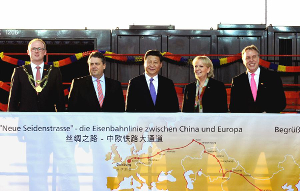 Chinese President Xi Jinping (C) visits Duisburg in Germany, March 29, 2014. [Xinhua/Rao Aimin]