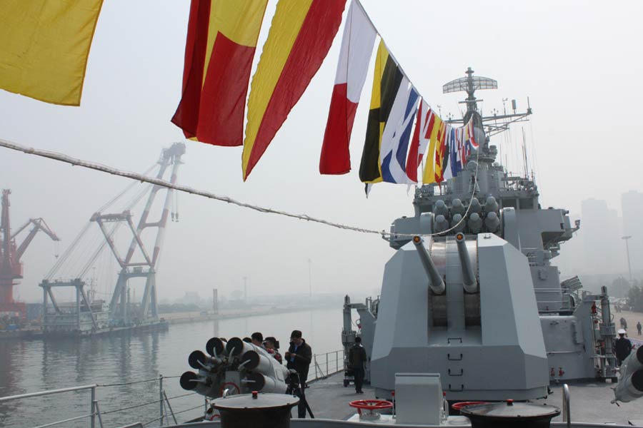 This photo shows the Chinese PLA navy destroyer Harbin which opened to the public in Qingdao, Shandong province, on April 20, as part of activities linked to the 14th annual meeting of the Western Pacific Naval Symposium. [Photo by Peng Yining/chinadaily.com.cn]