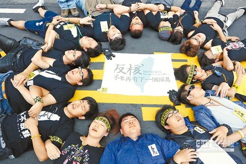 Taiwan halts nuclear construction amid protest. 