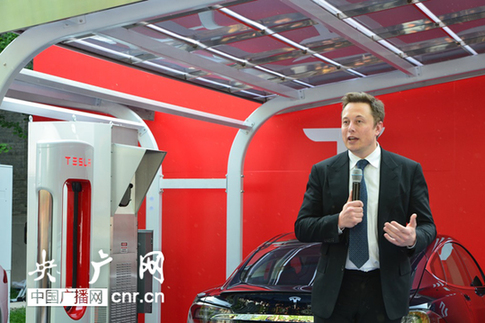 American electric-car giant Tesla Motors announced on April 23 that it is partnering with Chinese thin-film solar specialist Hanergy Solar Group to produce supercharger stations in China. [File photo] 