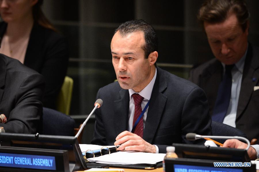 The acting president of the UN General Assembly, Mohamed Khaled Khiari, speaks during a special thematic debate of the UN General Assembly (UNGA) on 'Culture and Sustainable Development in the Post-2015 Development Agenda,' held at the UN headquarters in New York, on May 5, 2014. [Photo/Xinhua]