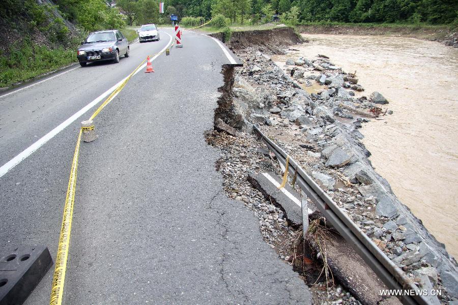 A highway leading to Banja Luka is seen destroyed during the flooding near Banja Luka, capital of Republika Srpska, an entity of Bosnia and Herzegovina on May 18, 2014. [Photo/Xinhua]