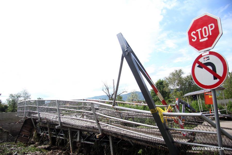 A bridge is seen destroyed during the flooding in Banja Luka, capital of Republika Srpska, an entity of Bosnia and Herzegovina on May 18, 2014. [Photo/Xinhua]