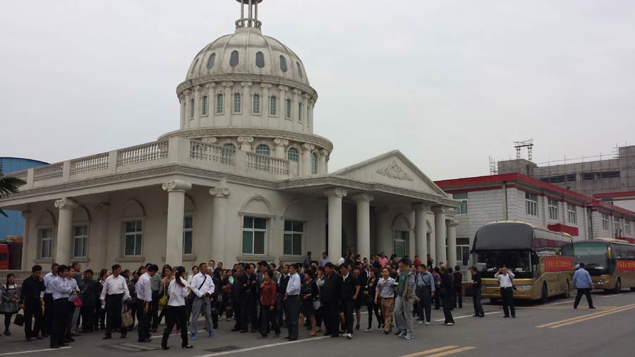 The company receives hundreds of visitors everyday. After hours of riding in buses to the site, many visitors need a toilet right away upon arrival. [Photo by Zhu Lixin China Daily]