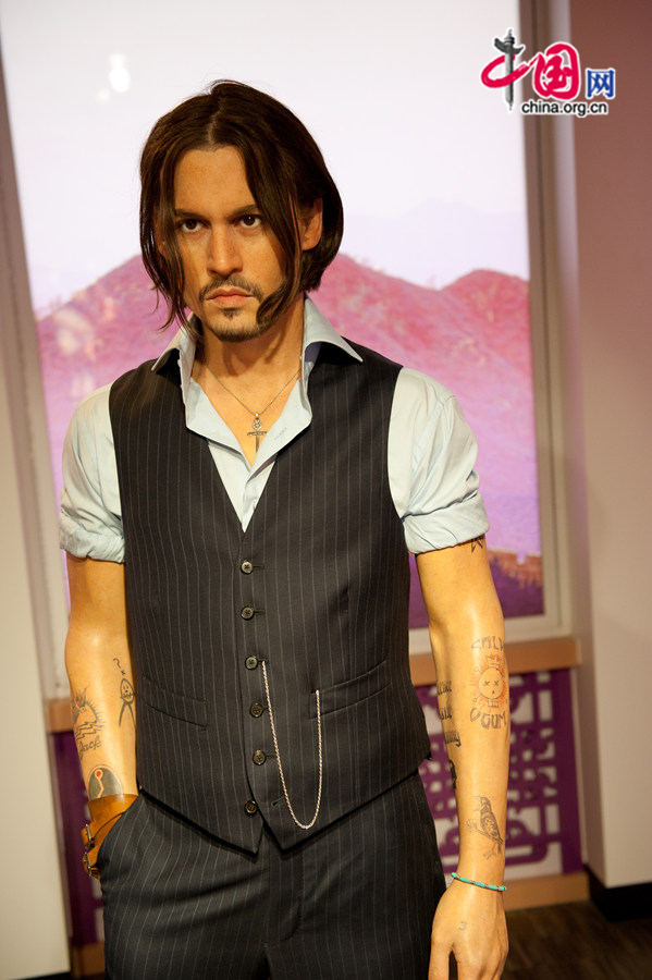 A wax figure of Johnny Depp is on display at Madame Tussauds Beijing on Thursday. The wax museum will be officially open to public on May 31, 2014. [Photo by Chen Boyuan / China.org.cn]