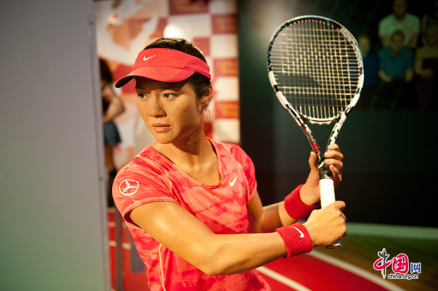 A wax figure of Chinese celebrated tennis player Li Na is on display at Madame Tussauds Beijing on Thursday. The wax museum will be officially open to public on May 31, 2014. [Photo by Chen Boyuan / China.org.cn]