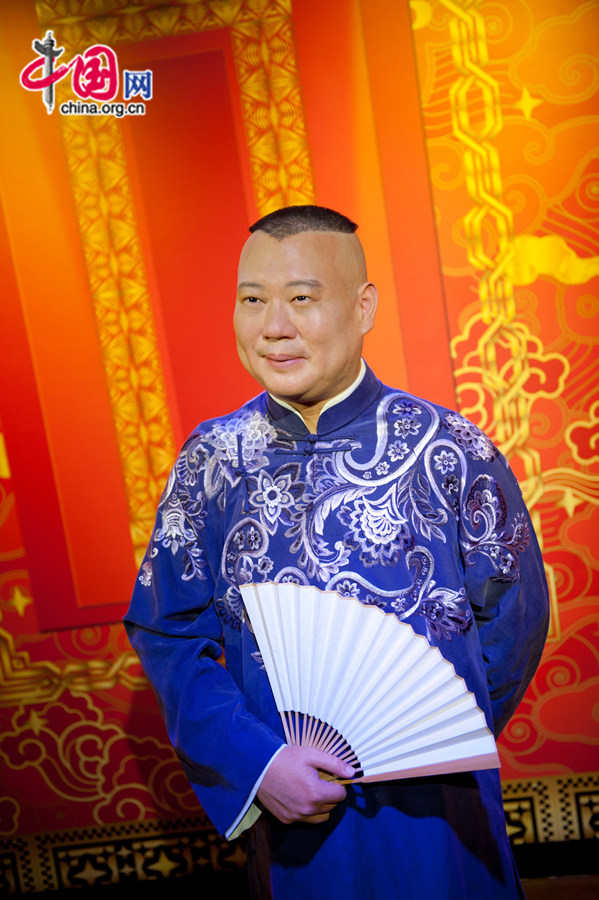 A wax figure of Guo Degang, a famous comedian, is on display at Madame Tussauds Beijing on Thursday. The wax museum will be officially open to public on May 31, 2014. [Photo by Chen Boyuan / China.org.cn]